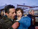Padre e hijo disfrutando de los churros con chocolate en San Xulián