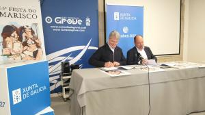 La firma entre el alcalde, José Cacabelos, y el Director da Axencia Turismo de Galicia, Xosé Manuel Merelles
