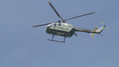 Helicóptero de la guardia civil sobrevolando el lugar del atentado de eta en Sanxenxo