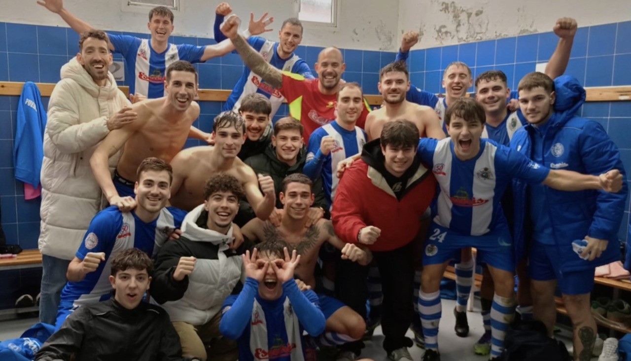 Los jugadores del Puebla celebran el triunfo